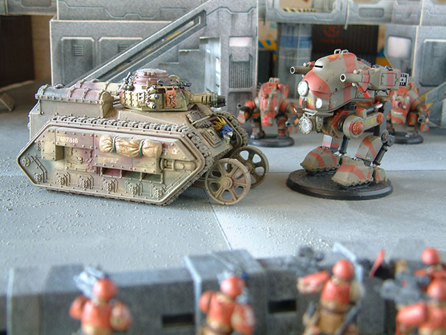 Imperial Guard Hellhound tank and Red Blok Nakovalny combat strider facing off