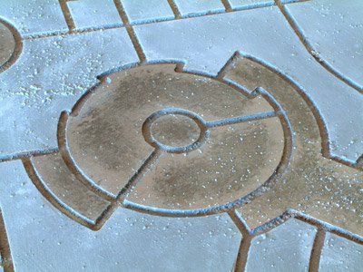 Close-up of one of the round things in the pavement